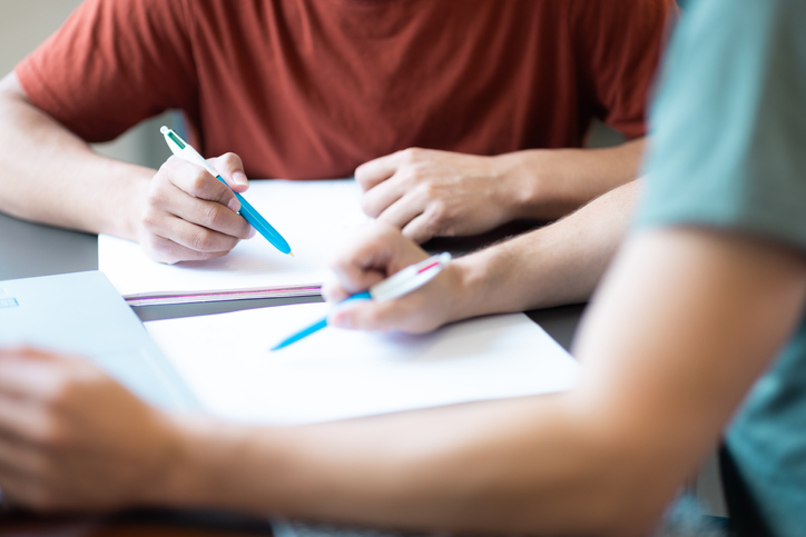 staff helps student with work staff helps student with work